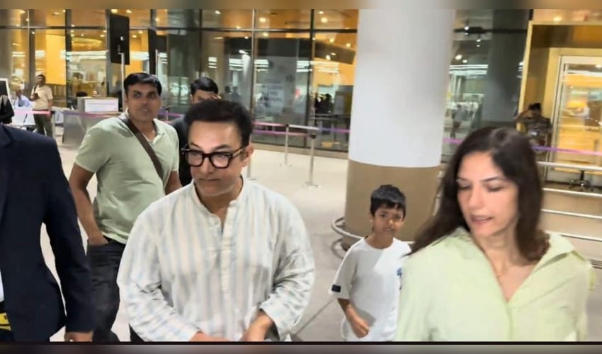 Aamir Khan returns to Mumbai with wife Gauri Spratt, stepson gets confused by paparazzi frenzy at airport