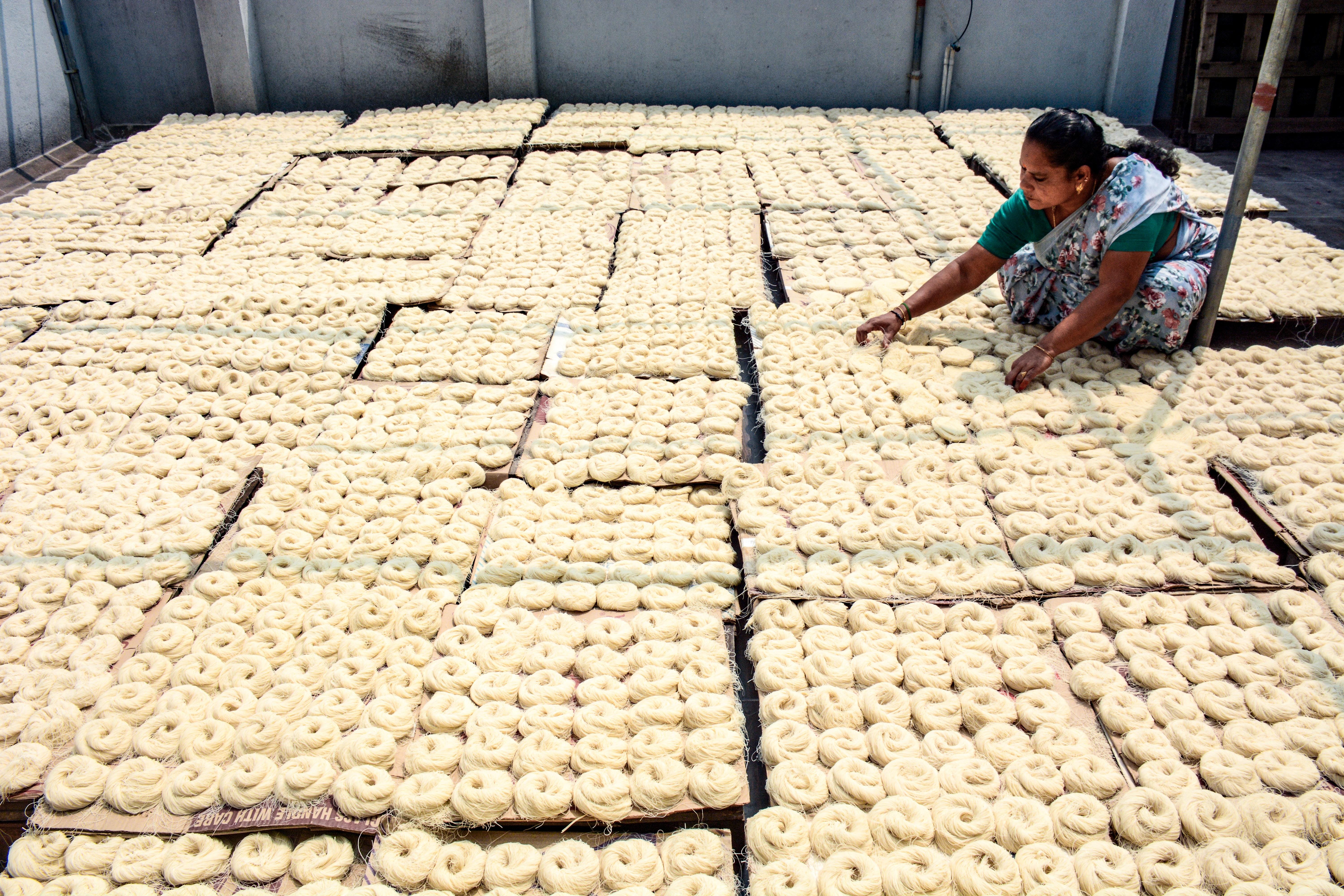 Chennai: Worker sorts drying seviiyan for Ramadan delicacy