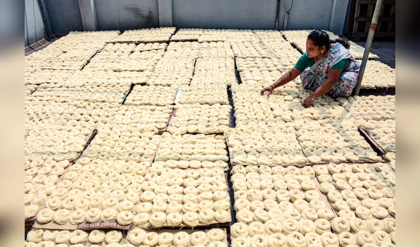 Chennai: Worker sorts drying seviiyan for Ramadan delicacy