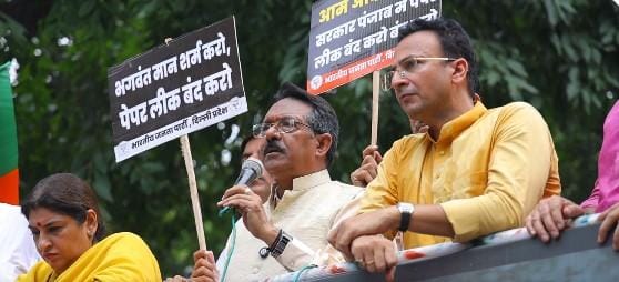 Delhi BJP chief leads protest against paper leaks in AAP-ruled Punjab