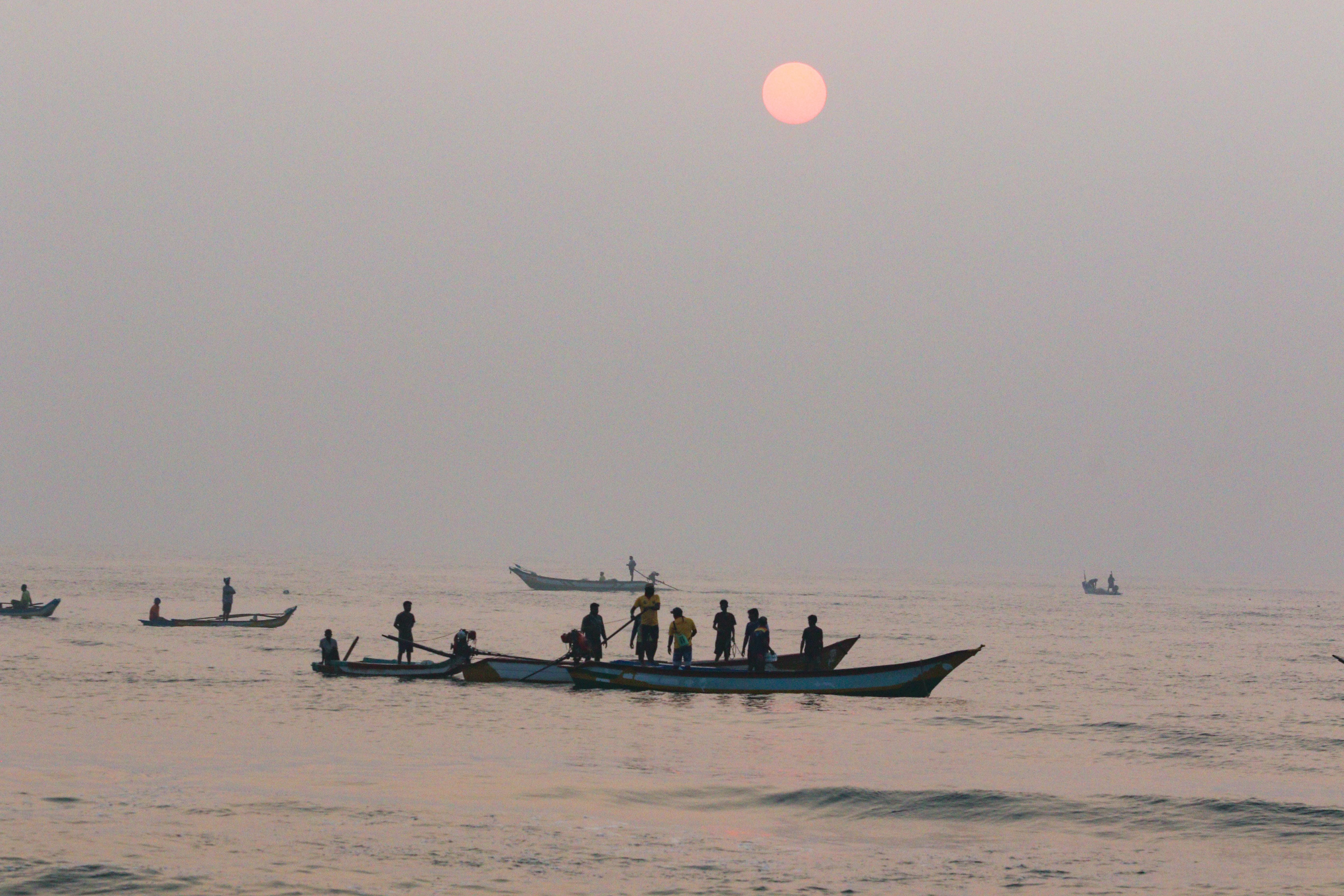 Fishermen Sail at Sunrise from Marina Beach