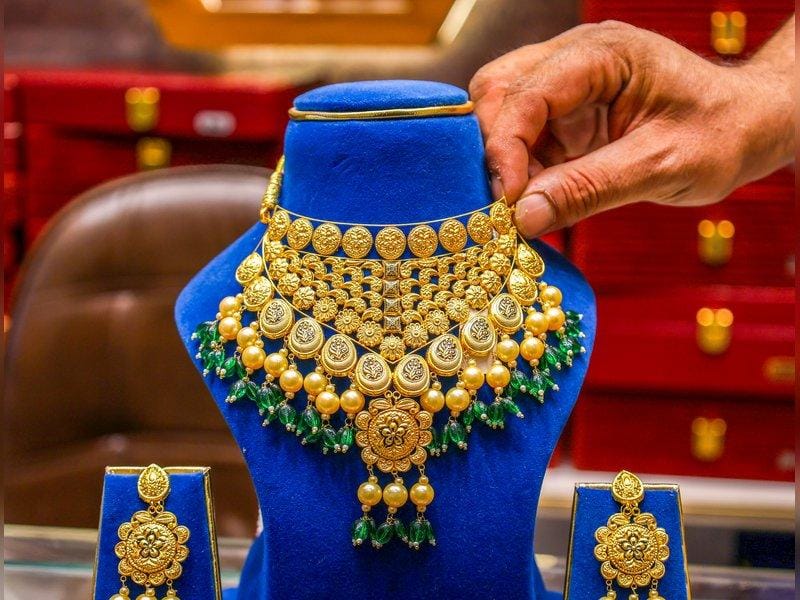 Gold prices drop marginally as investors await US Fed Chair remarks