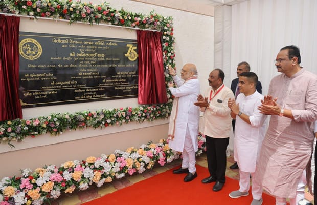 Gujarat: HM Amit Shah inaugurates new vegetable sub-yard at Dahegam APMC (Photo: IANS)