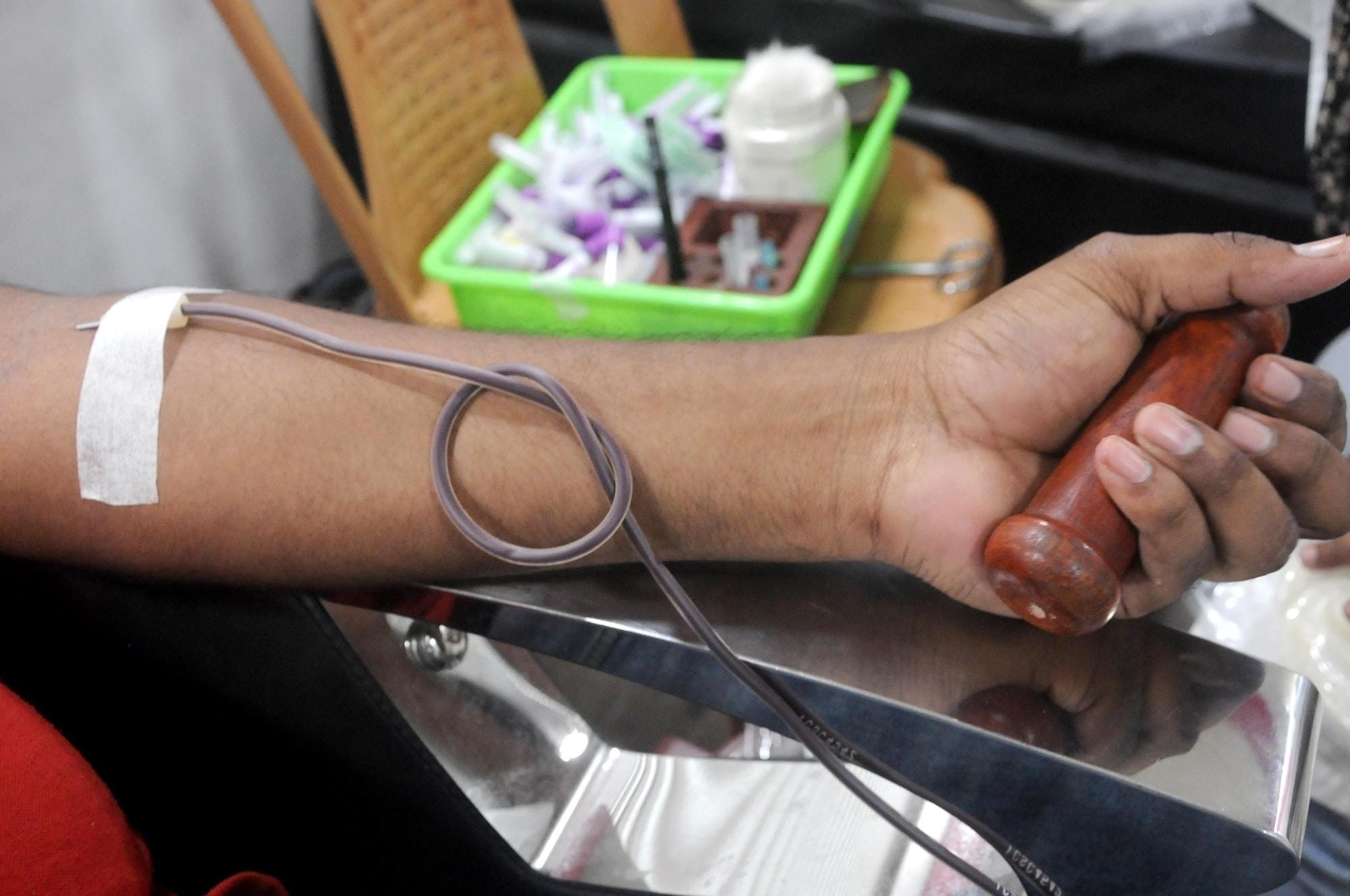Health worker, blood sample, mobile blood donation van,  blood donation camp
