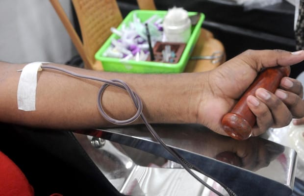 Health worker, blood sample, mobile blood donation van, blood donation camp