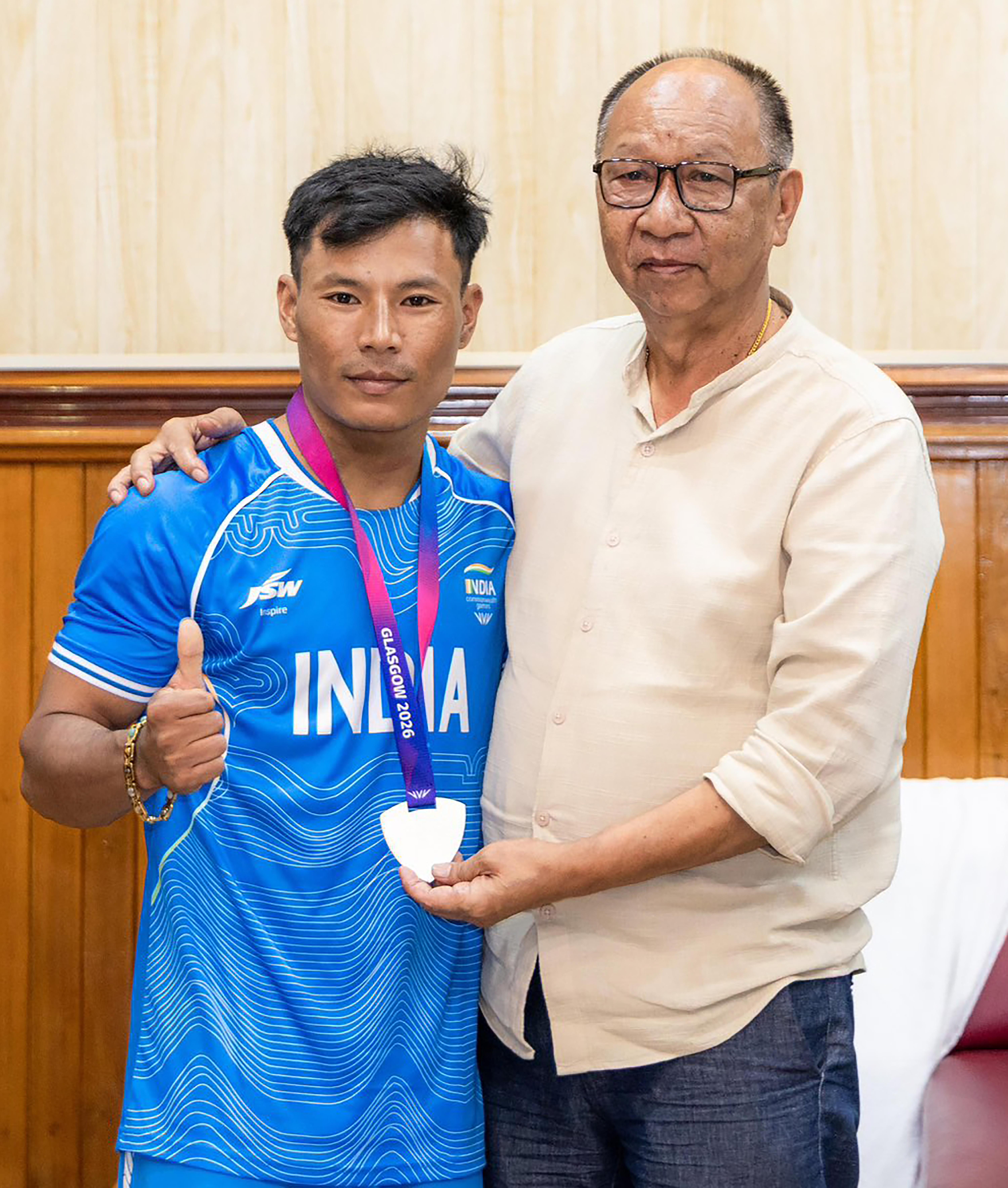 Imphal: Manipur CM felicitates CWG silver medallist Rishikanta Singh