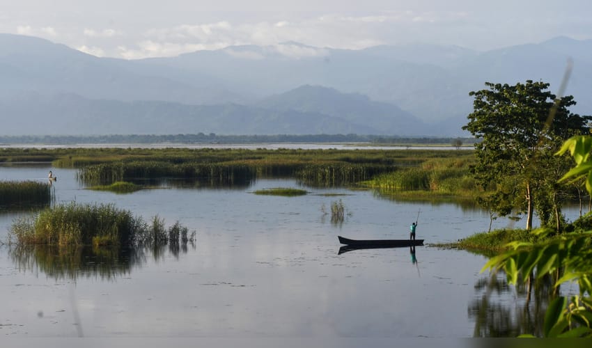 Jalpaiguri: Boatman Waits on the Teesta River After Rain