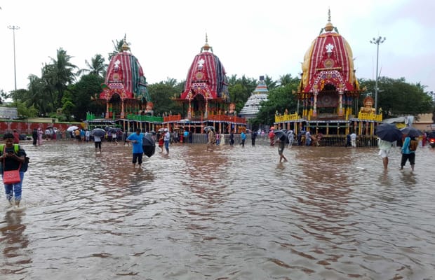July 2018,Odisha,Odisha Floods,People wade through flood water