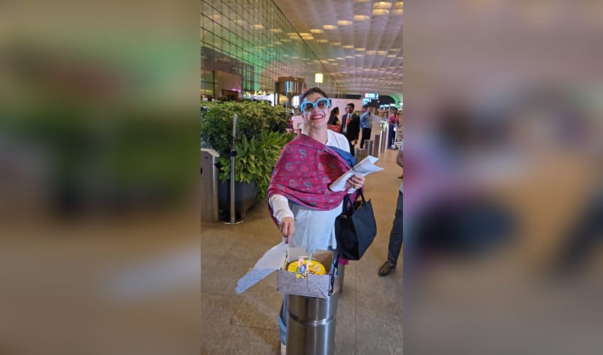 Kajol cuts birthday cake with paps at airport, shy Nysa Devgn stays out of frame