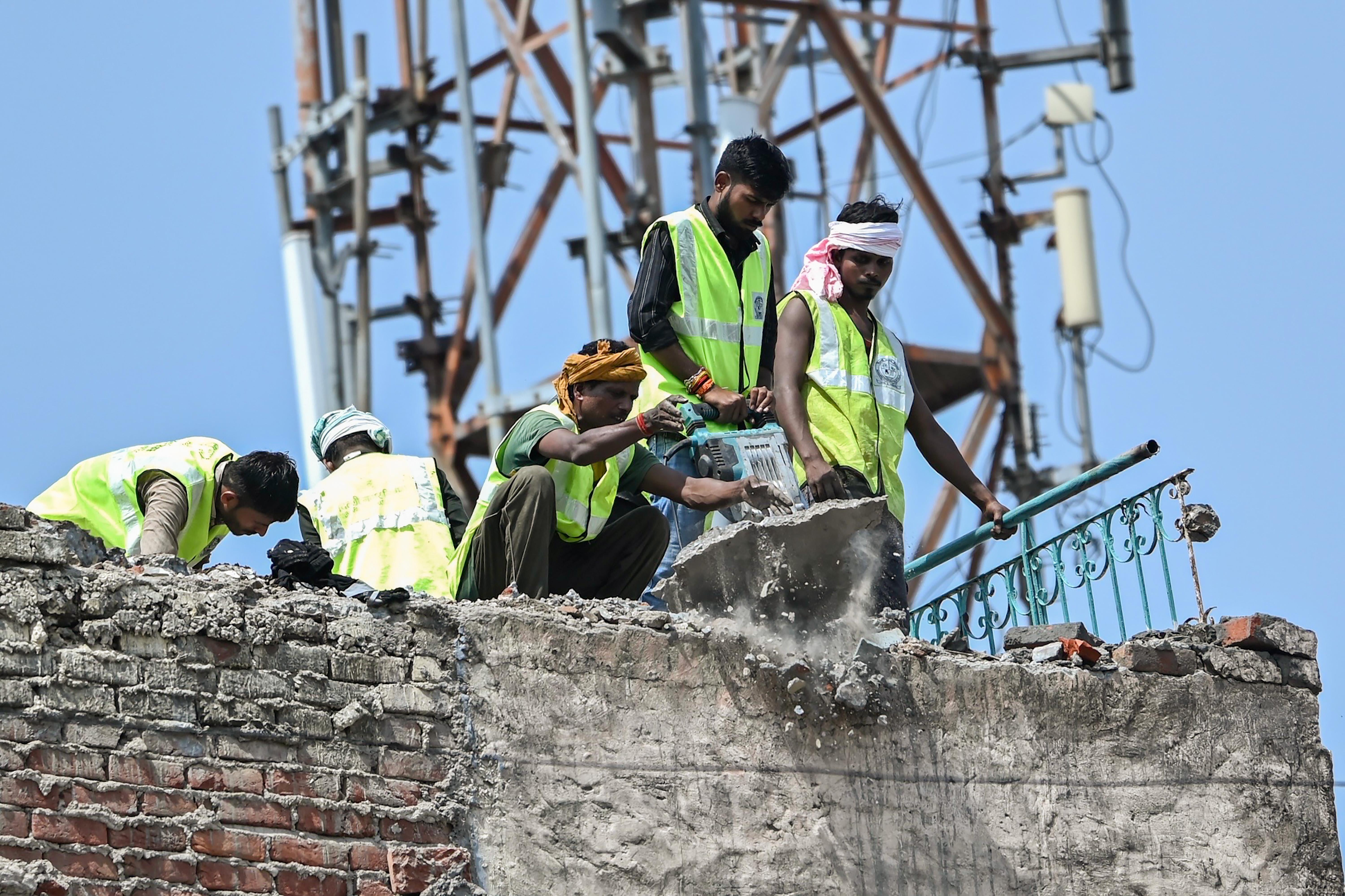 New Delhi: Adjoining building demolished after collapse at Satya Niketan
