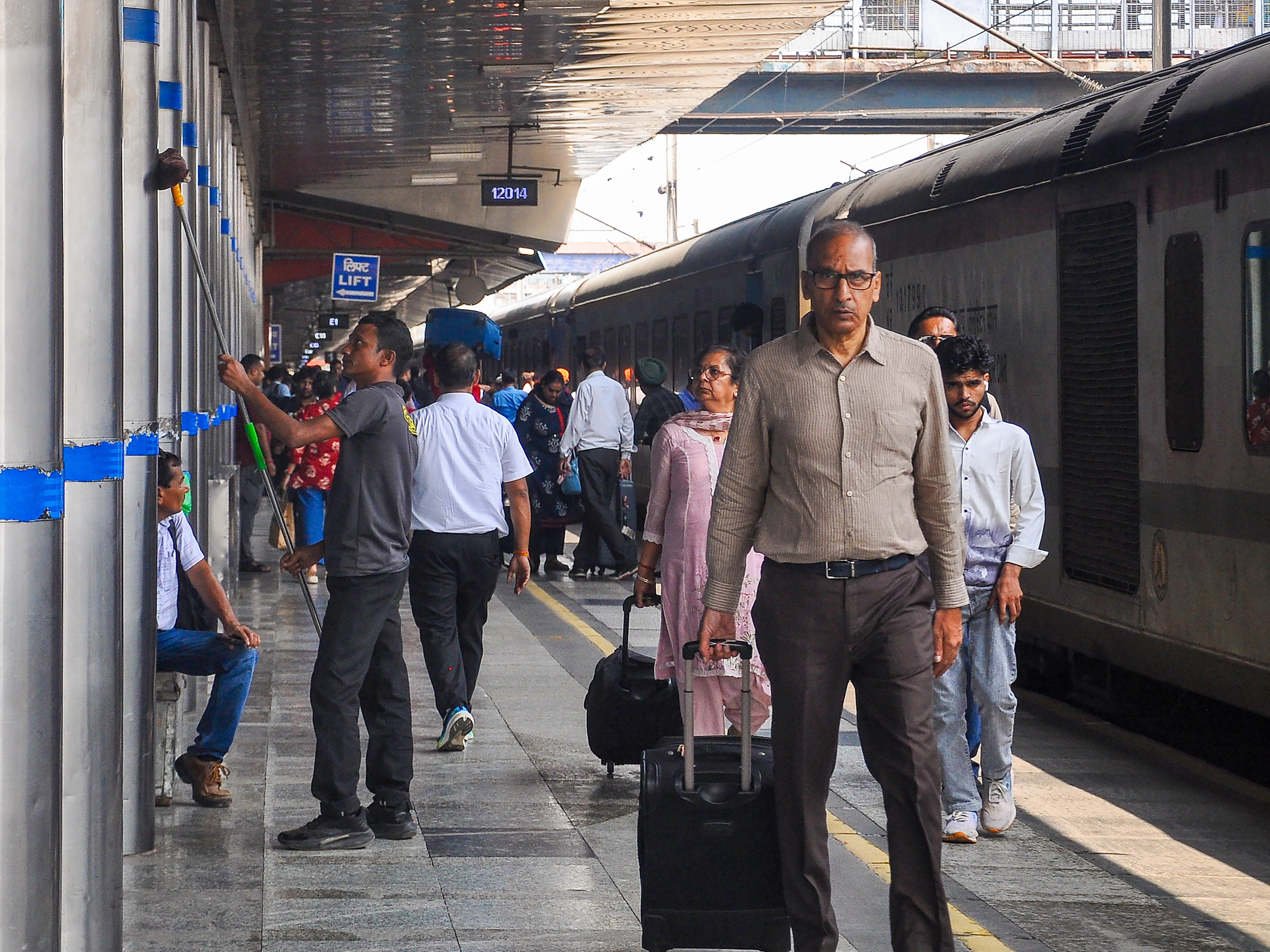 New Delhi: Passengers at New Delhi Railway Station