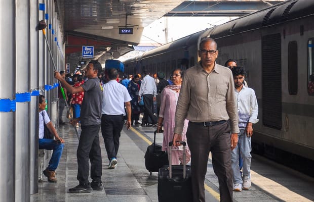 New Delhi: Passengers at New Delhi Railway Station