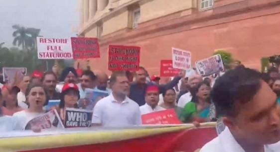 Opposition MPs march in Parliament over Jantar Mantar police action, Ram temple donation row