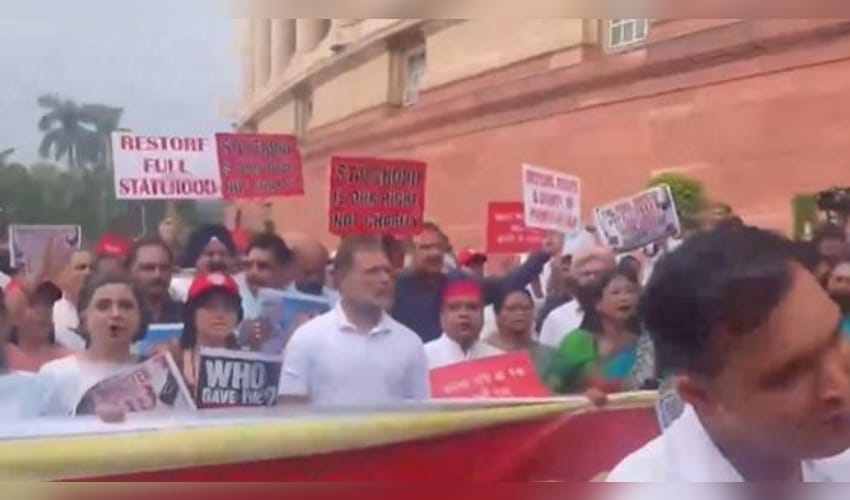 Opposition MPs march in Parliament over Jantar Mantar police action, Ram temple donation row