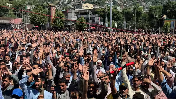 pok_protests_reuters_1_2026_06_14a3ae53bc8170dcb928677e0a9000c97de9921a_2128_44ae_8de7_cdad8352af47
