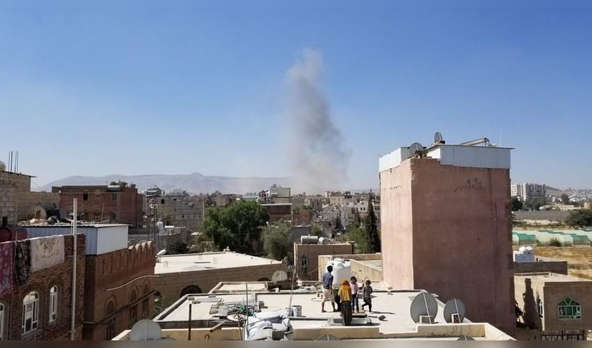 Sanaa,smoke,military camp,controlled,airstrike,Yemen,Saudi,airstrike,Houthi,